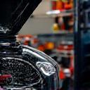 Mechanic repairing car engine